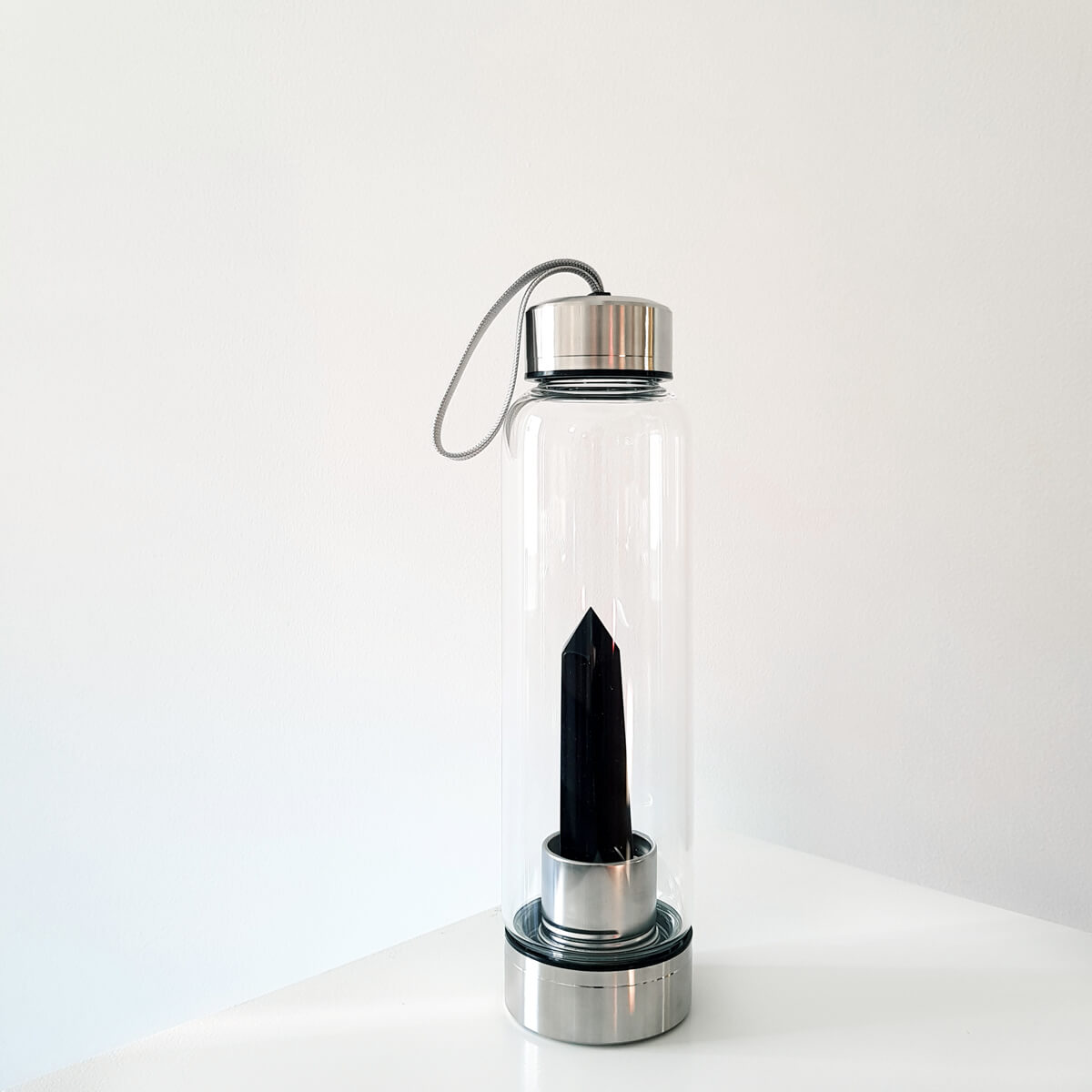 botella con punta de obsidiana