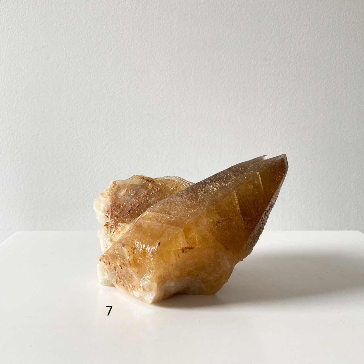 Calcita miel en punta calidad media 7