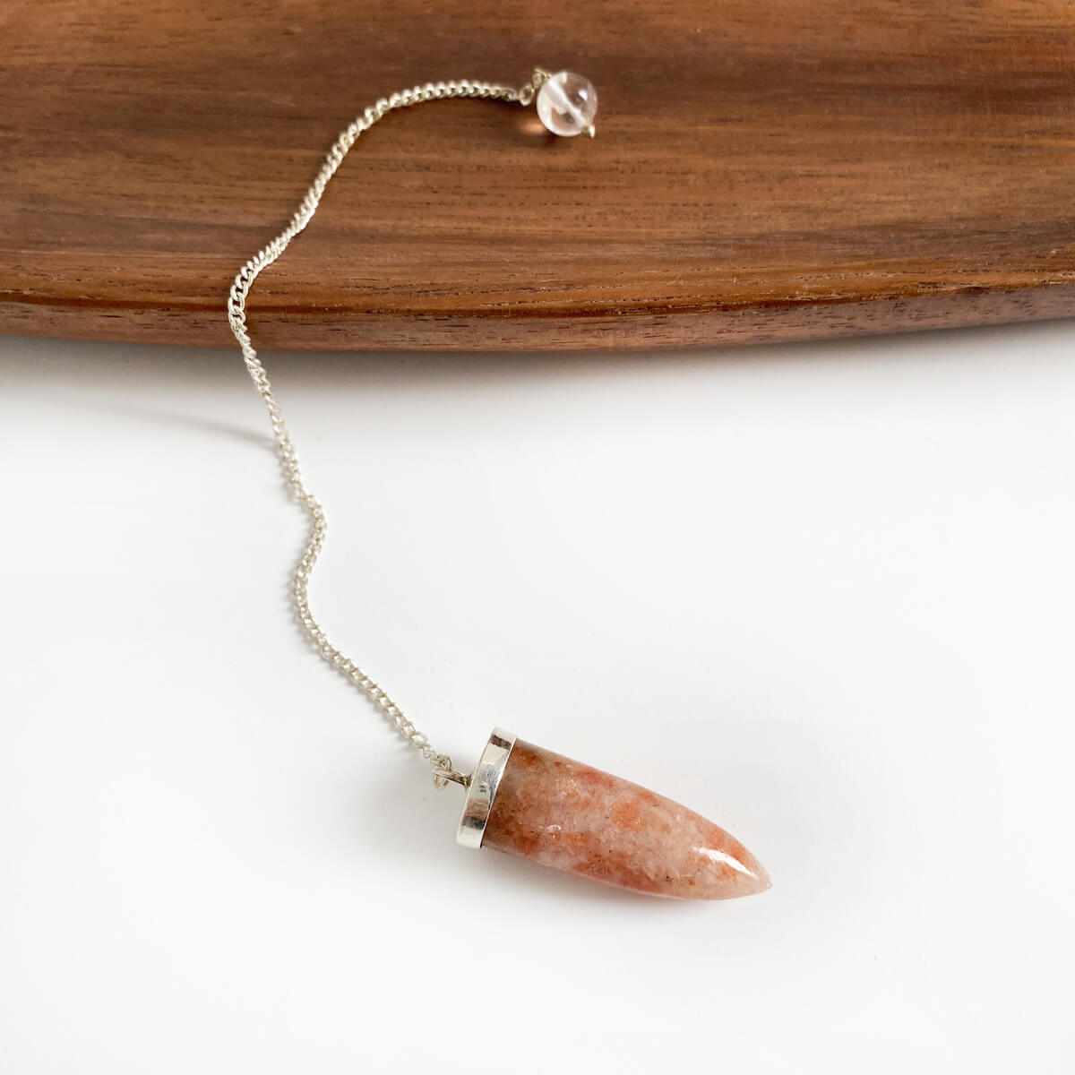 Péndulo de piedra sol cadena