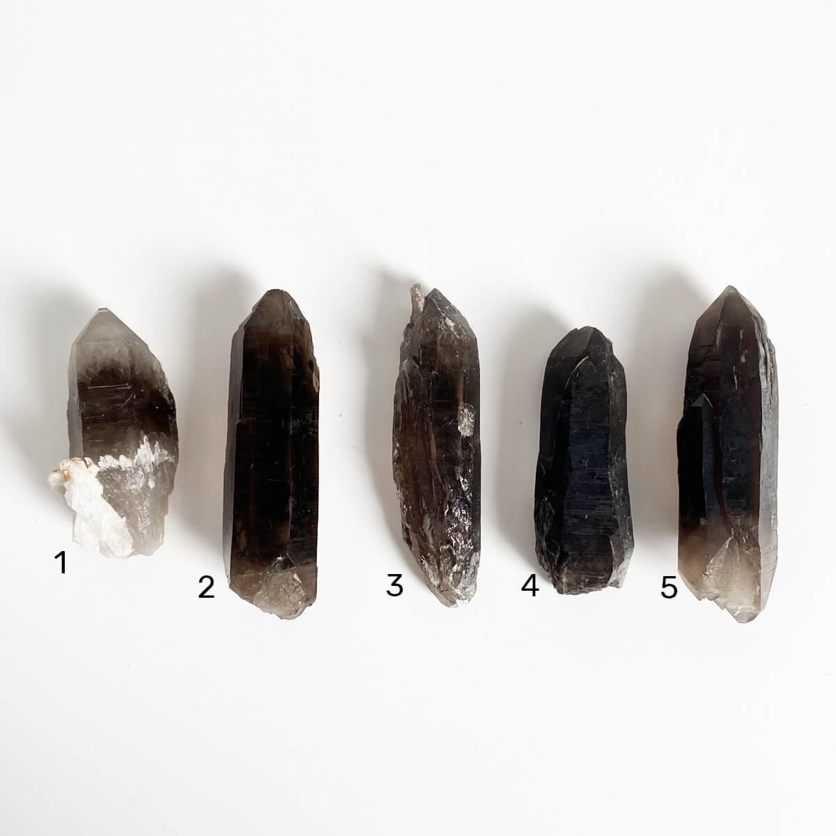 Puntas de cuarzo ahumado semipulido alargada