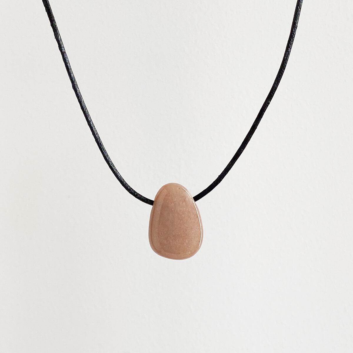 colgante de piedra sol