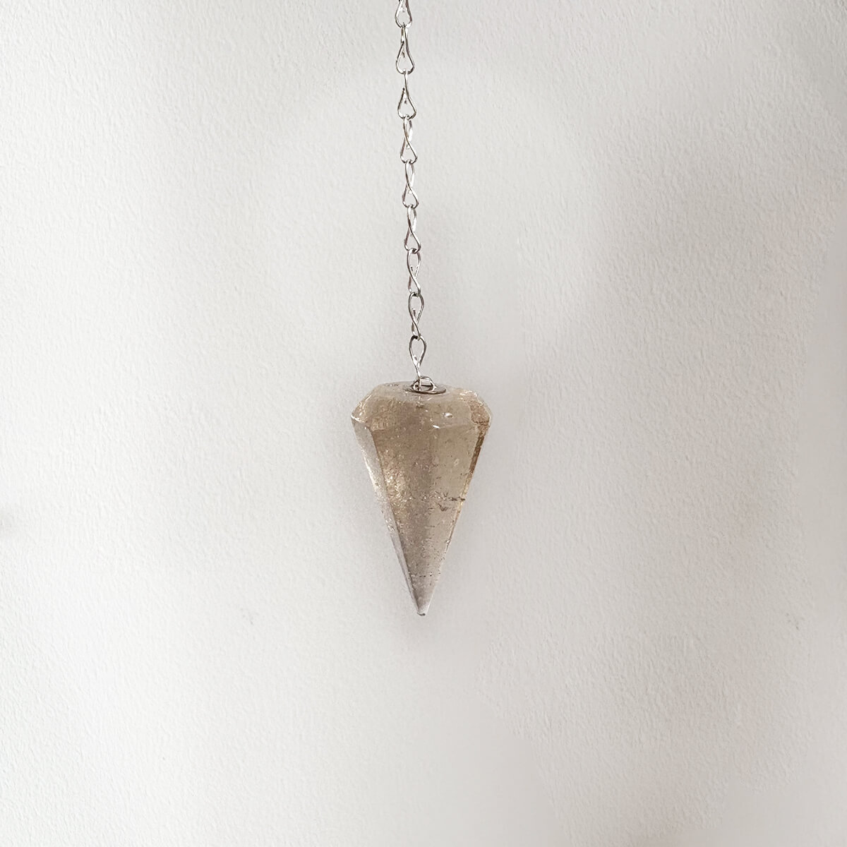 péndulo de cuarzo ahumado