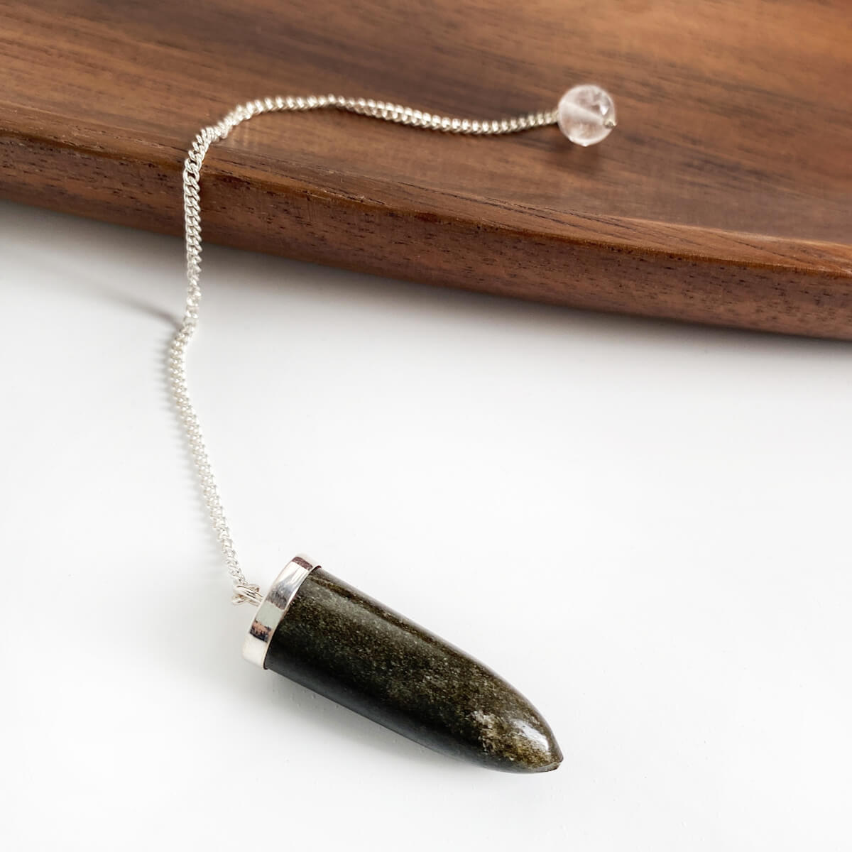 péndulo de obsidiana dorada cadena