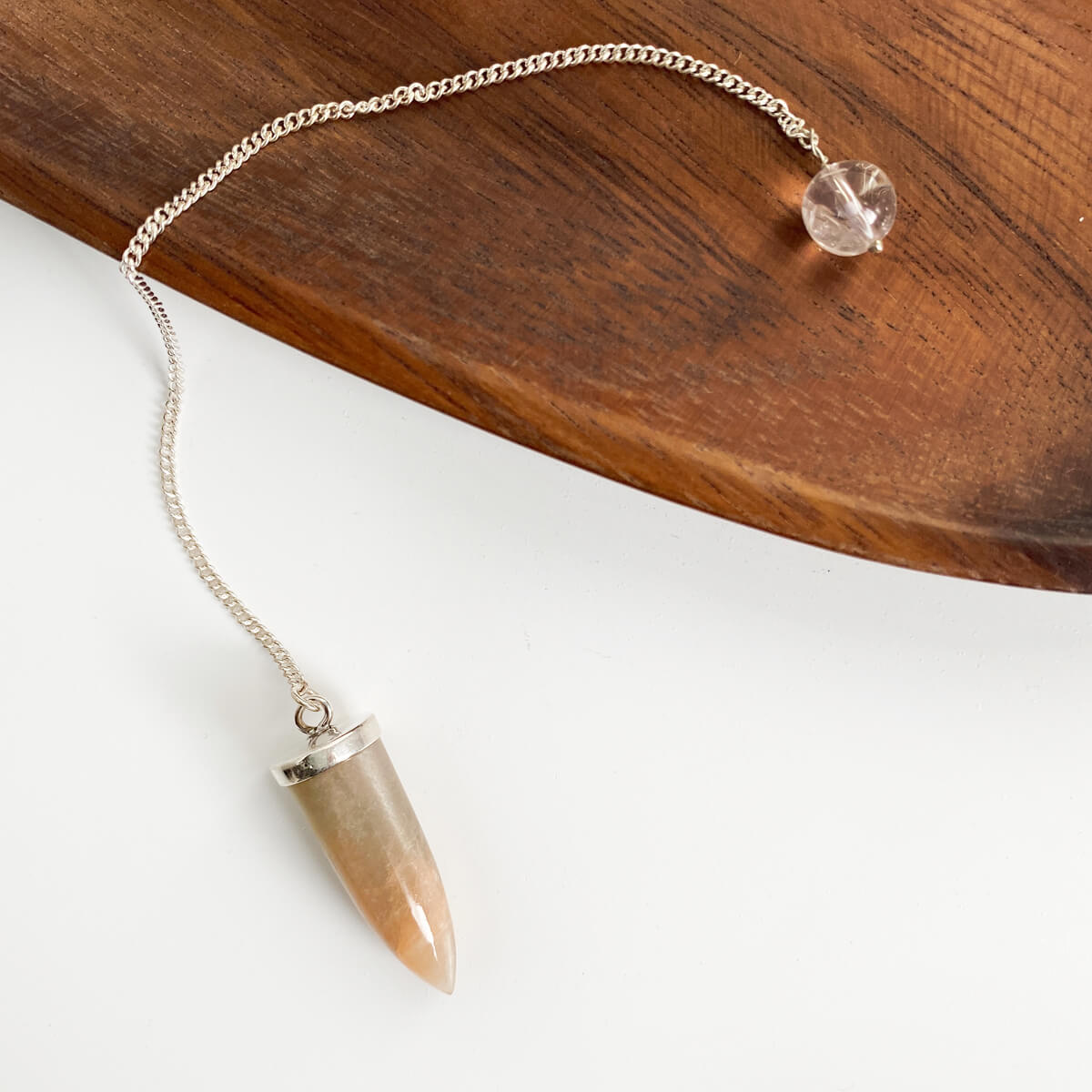 péndulo de piedra sol y piedra luna cadena