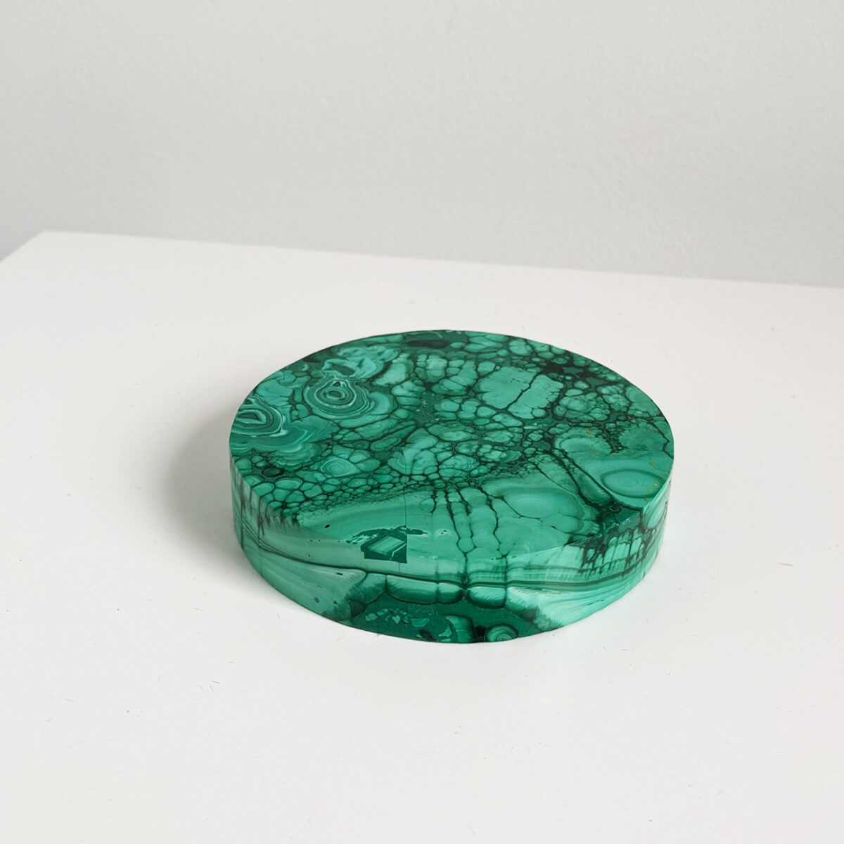 placa redonda de malaquita