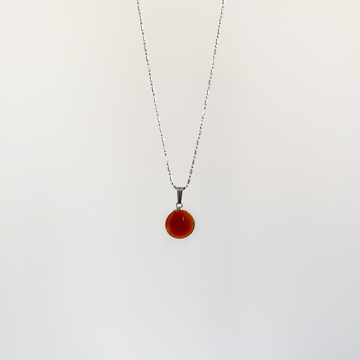 Colgante de ágata cornalina redondo