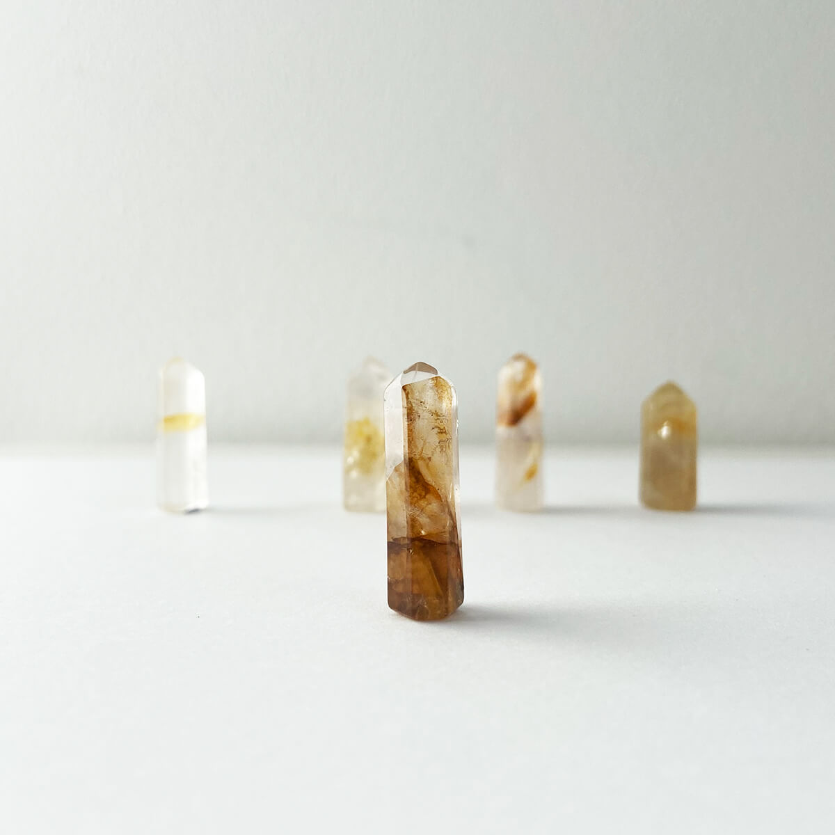 Punta de cuarzo sanador dorado mini